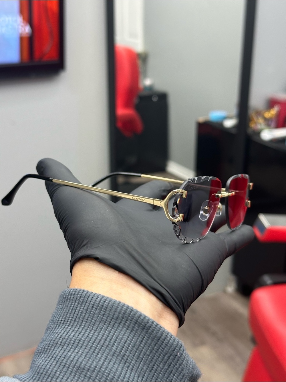 Cartier Men’s Rimless Sunglasses with Red Gradient Lenses and Gold Temples